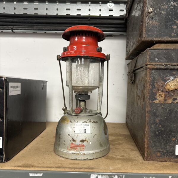Vintage Bialaddin Model 315 kerosene lamp with red hood.