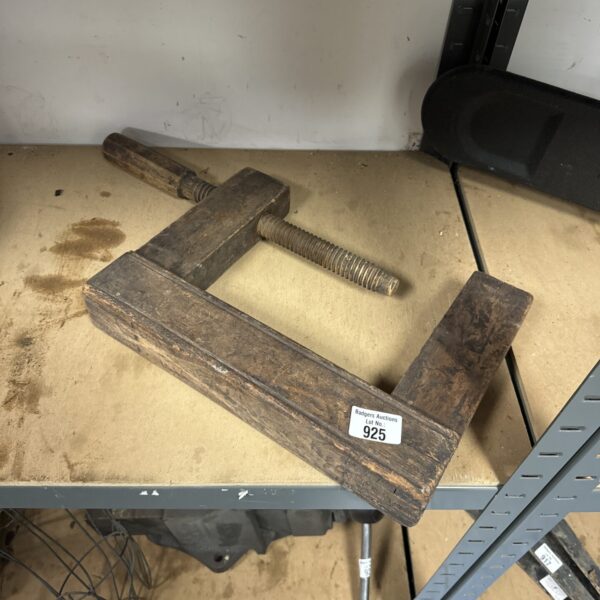 Antique 19th-century wooden joist clamp for carpentry and woodworking.