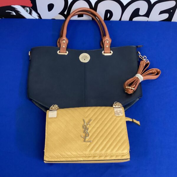 Designer style handbags, a black tote and a smaller shoulder bag.
