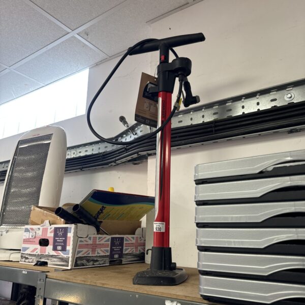 Red Bontrager Turbo Charger bicycle floor pump with gauge.