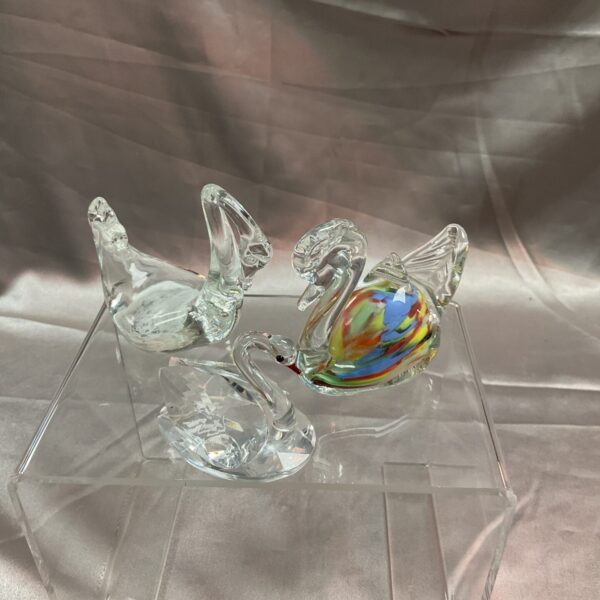 Set of three delicate Murano glass swan figurines.