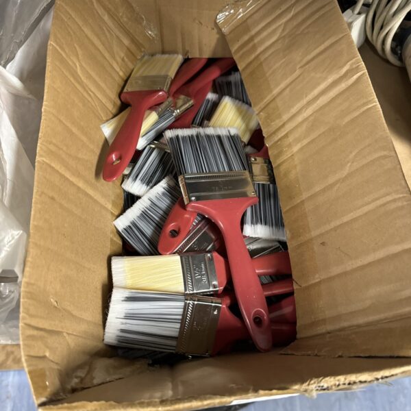 New assorted paintbrushes still in their original packaging.