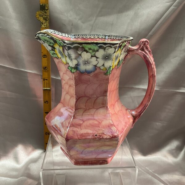 Antique pink lustre jug with floral design, vintage ceramic collectible.