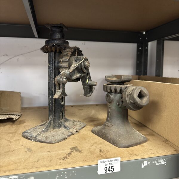 Two vintage cast iron car jack bodies for restoration.