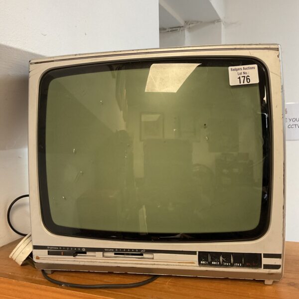 Front view of a vintage 15” CRT television.