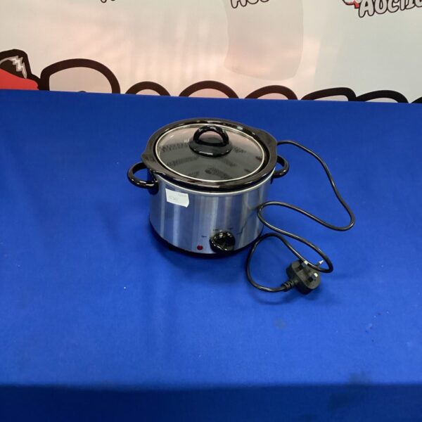Small ceramic slow cooker for preparing individual meals.