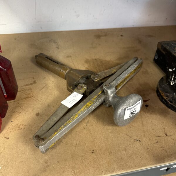 Vintage pop rivet gun, a classic metalworking hand tool.