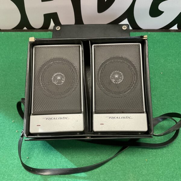 Vintage Realistic desktop speakers in black and silver.