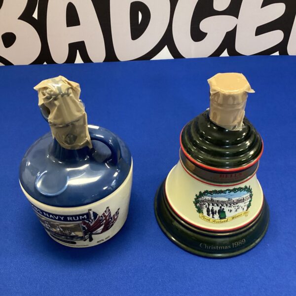 Vintage Bell's Christmas 1989 and Lamb's Navy Rum collectible bottles.