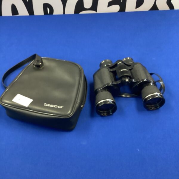 Vintage Tasco binoculars with carrying case, classic field glasses.