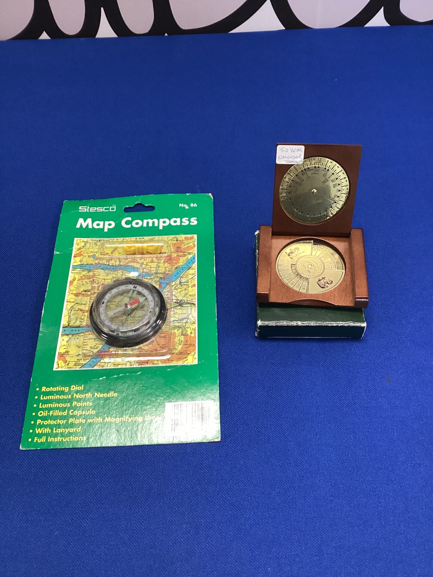237 Fifty year calendar with stesco map compass