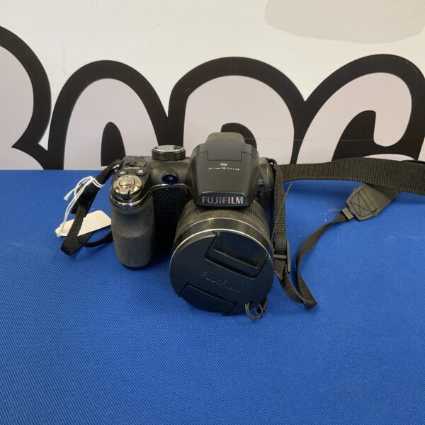 Vintage Fujifilm FinePix 5 digital camera, side view.