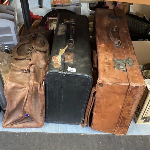 Lot of four vintage brown leather cases, antique luggage.