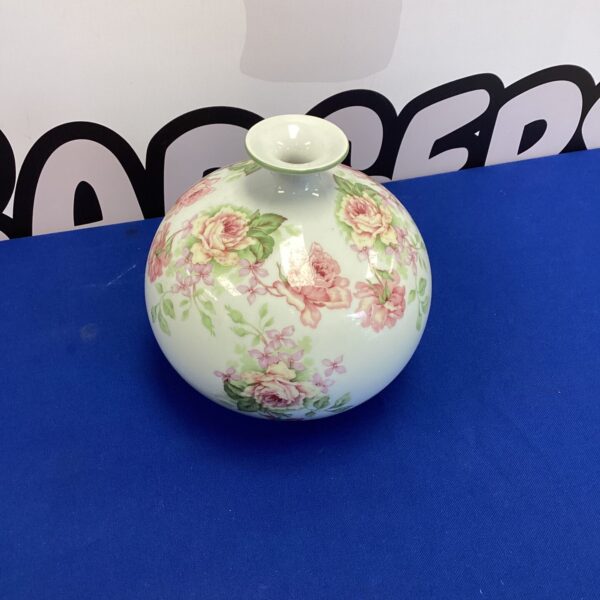 Vintage Limoges floral vase with delicate hand-painted design.