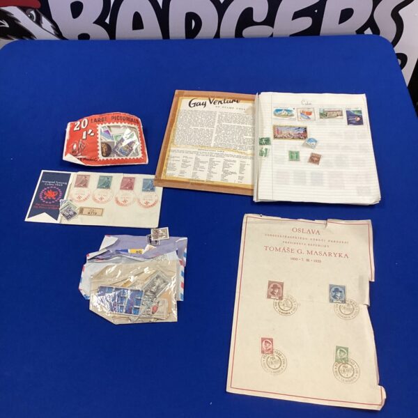 Vintage stamp collection album with world stamps inside.
