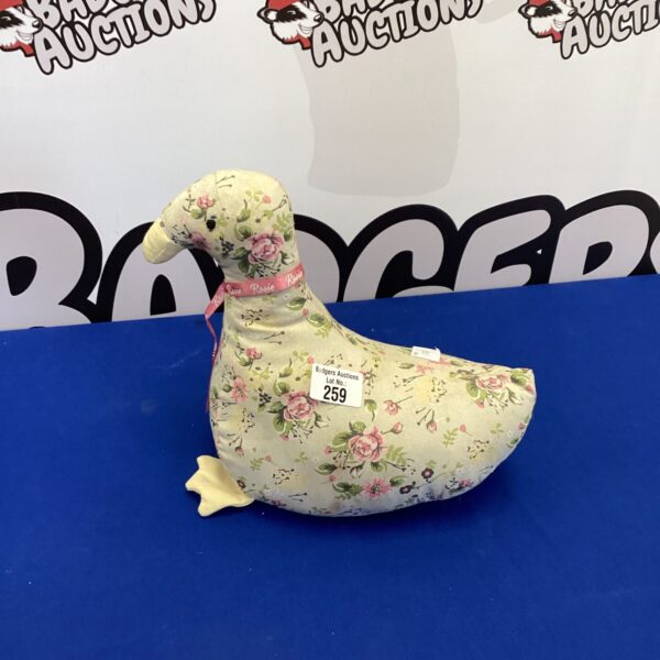 Vintage fabric goose door stop with colourful pattern.