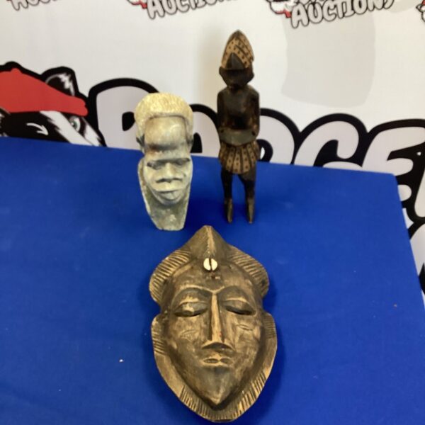 Hand-carved African face mask, a beautiful wood carving.