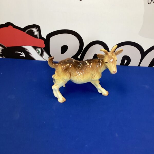 Vintage Melba Ware goat figurine, detailed Australian pottery.