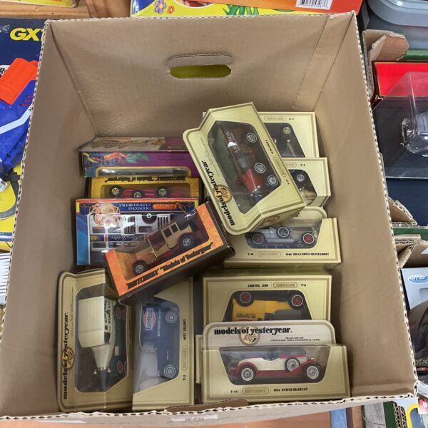 Vintage and modern Matchbox diecast cars in a mixed lot.