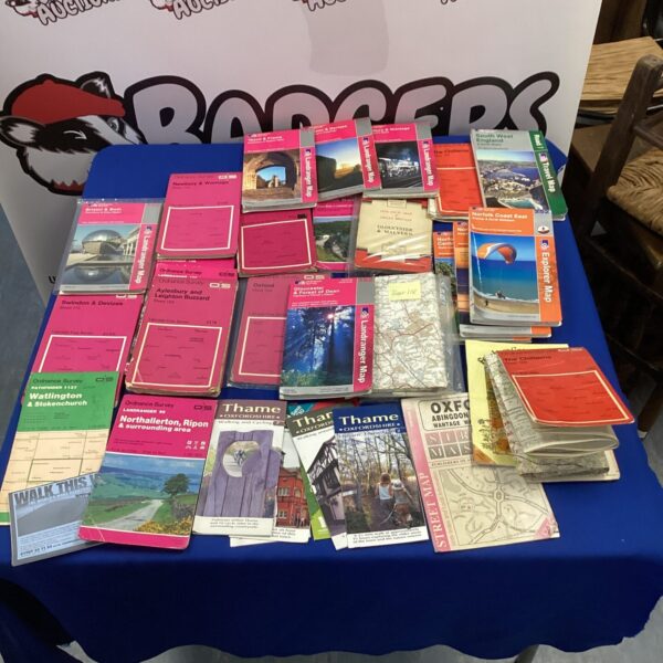 A lot of vintage ordinance survey maps and travel guides for Thame, Oxfordshire.