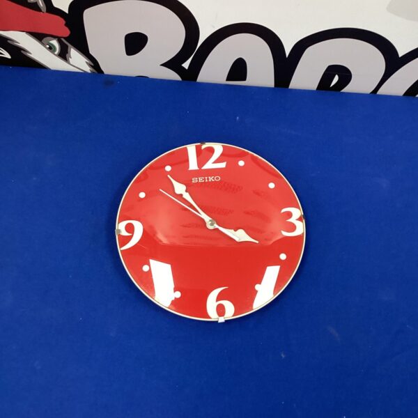 Vintage Seiko wall clock with bold hour markers.
