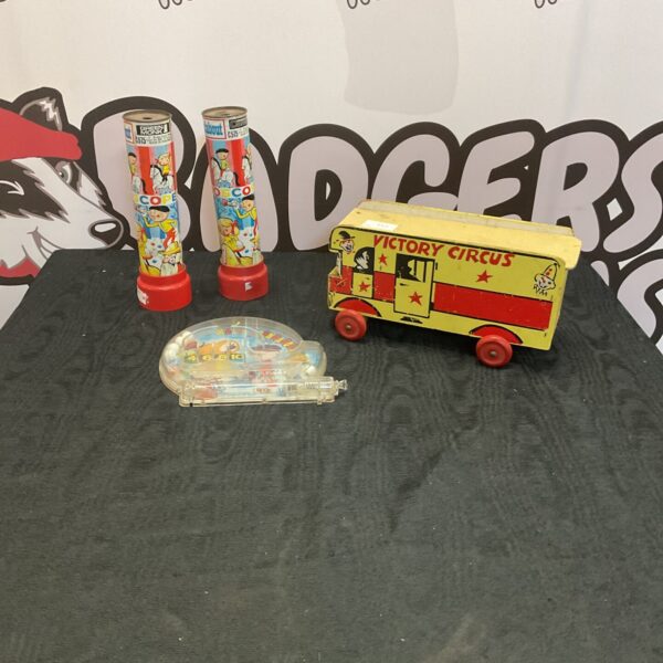 Vintage bagatelle game and Magic Roundabout toys for collectors.
