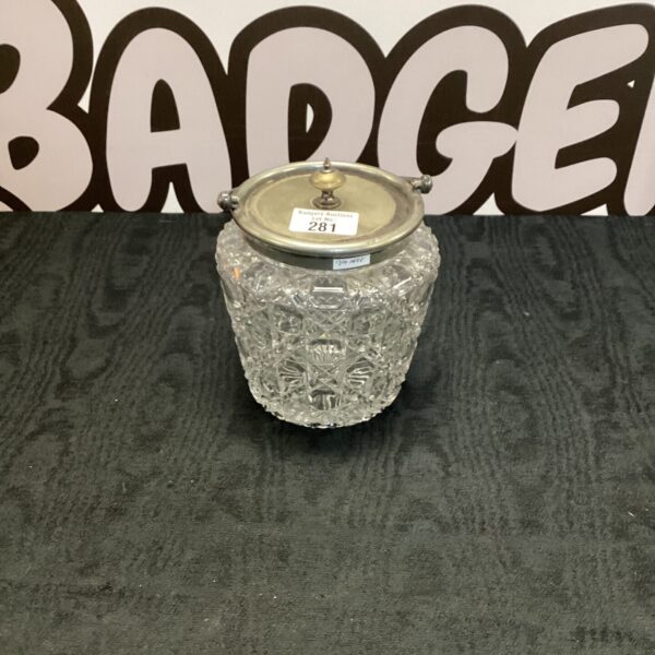Intricate vintage cut glass biscuit barrel with silver lid.