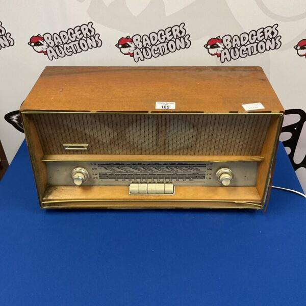 Vintage Saalburg 5170c radio in wooden cabinet.