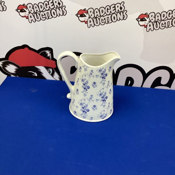 Delicate floral National Trust porcelain water jug for collectors.