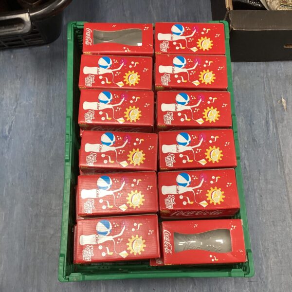 Box of twenty-four vintage Coca Cola glasses, collectible glassware.