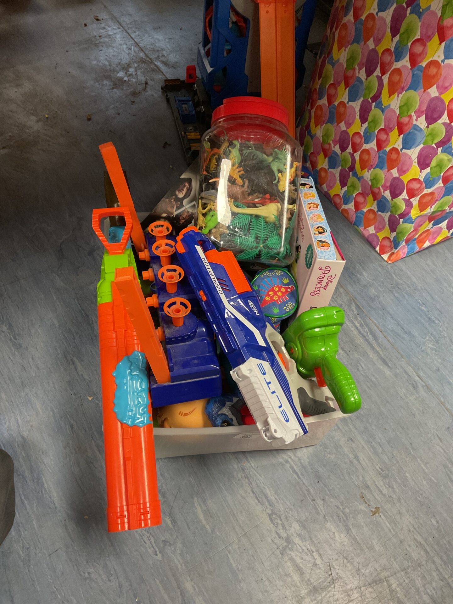 394 Box of mixed toys including nerf guns, dinosaur figures and a star wars mousepad