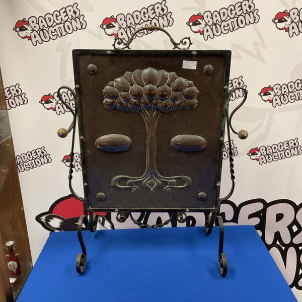 Antique Art Nouveau firescreen with floral wrought iron and copper detailing.