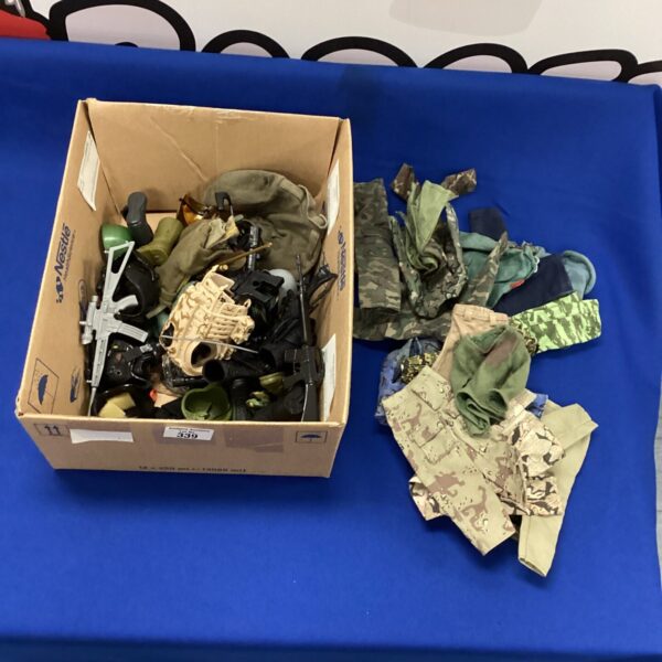 Vintage Action Man uniforms and equipment lot for collectors.