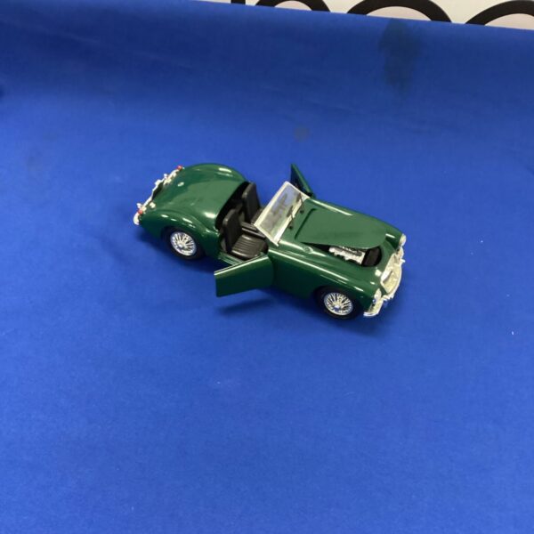 Green diecast MGA model car, classic British sports car.