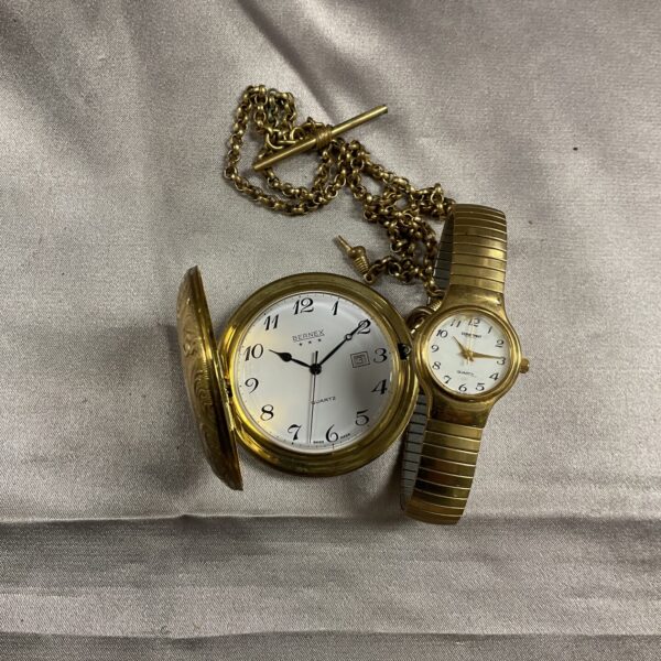 Vintage Berne’s pocket watch and chain set, gold tone.