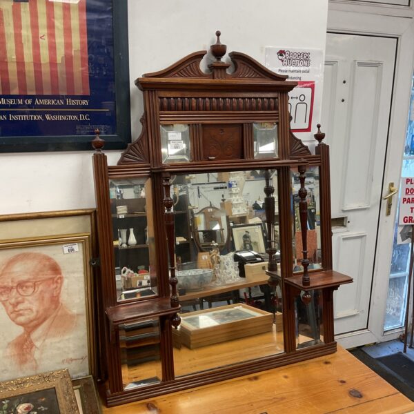 Antique Edwardian mahogany overmantle mirror with bevelled edge and stepped shelves.