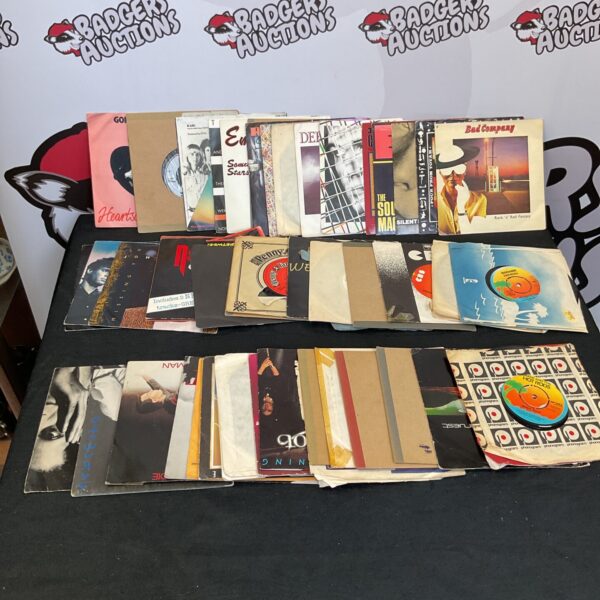 Vintage lot of 7 inch vinyl singles including Bad Company.