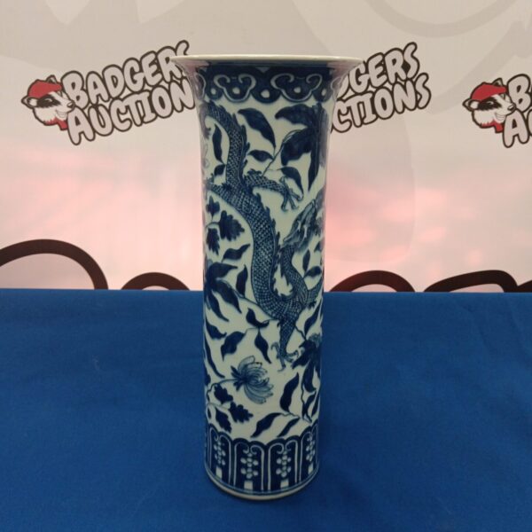 Antique Chinese blue and white porcelain vase with dragon pattern.