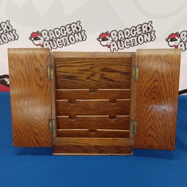 Antique oak letter rack with doors open, vintage desk organizer.