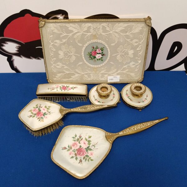 Vintage dressing table set with hand-painted rose design.