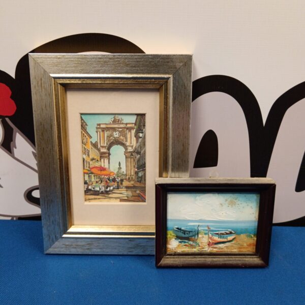 Delicate miniature watercolour painting of a Parisian street scene.