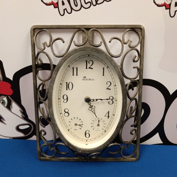 Antique Adorn wrought iron wall clock and barometer.