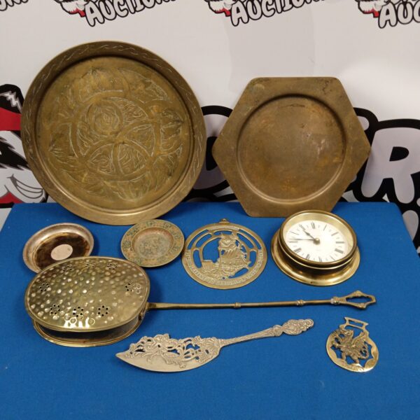 Vintage brass tray with chestnut pan and clock for collectors.