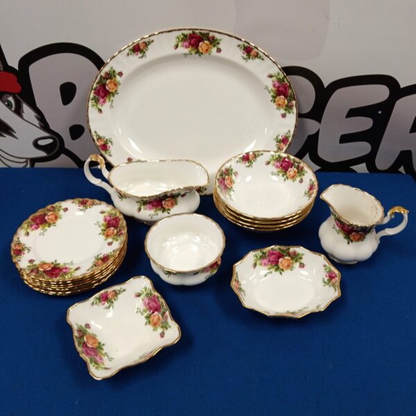 Royal Albert Old Country Roses china collection displayed on a table.