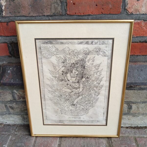 Vibrant Tibetan Buddhist batik print of a deity.