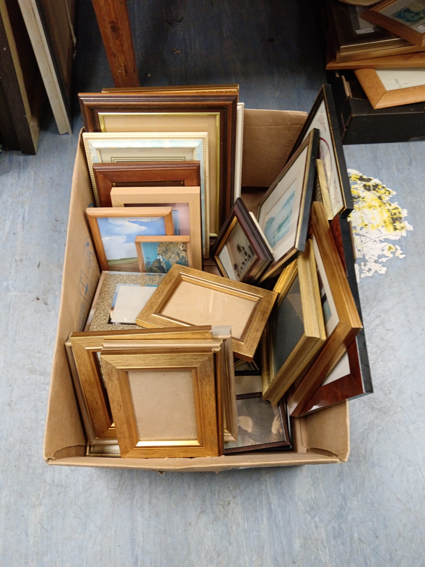 647 Box full of photo frames