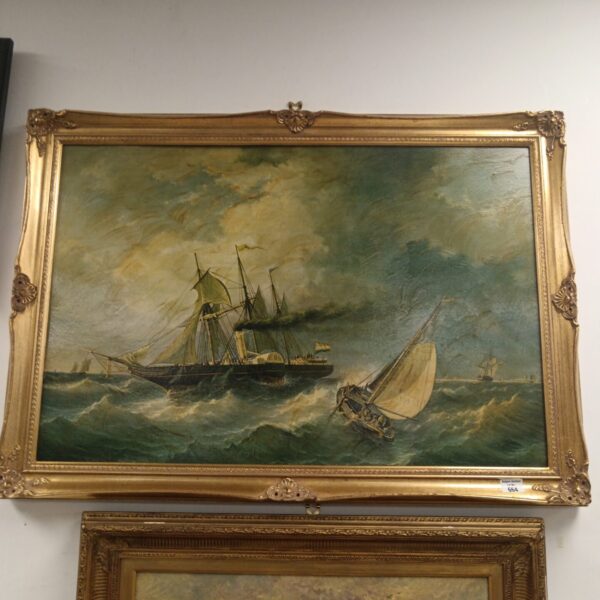 Vintage print of ships in rough seas with gilt frame.