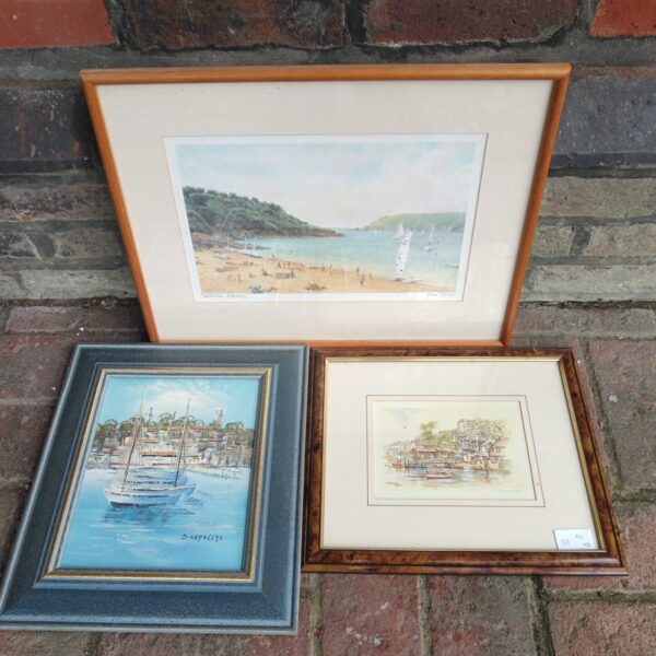 Vintage John Gillo coastal print in a gold frame.