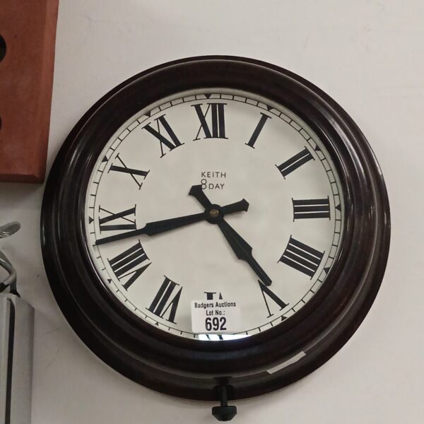 Vintage Keith 8 day wall clock with bold numerals.
