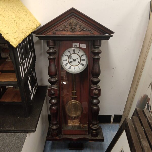 Antique Vienna wall clock with walnut and mahogany case.
